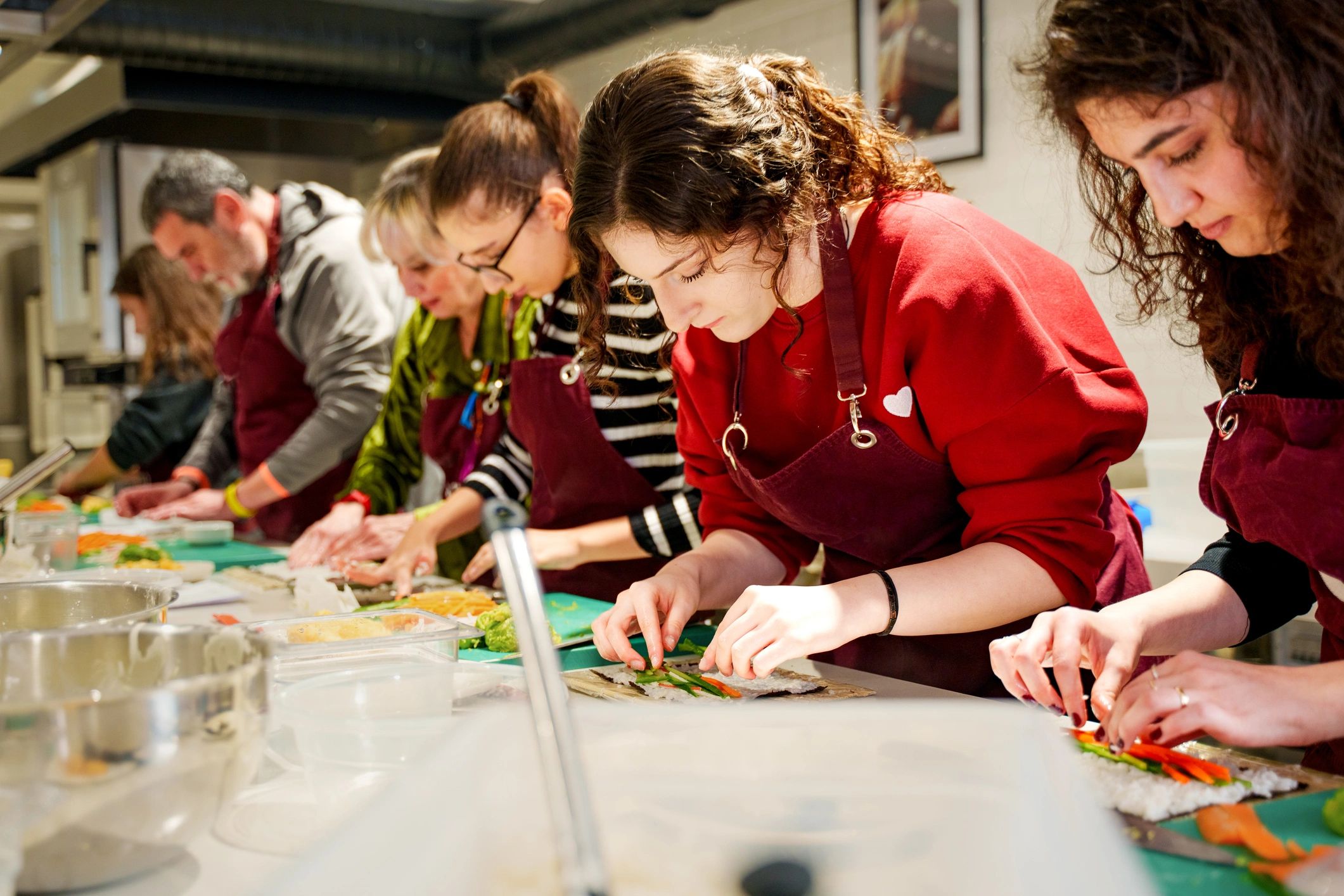 Hospitality professionals collaborating in a kitchen